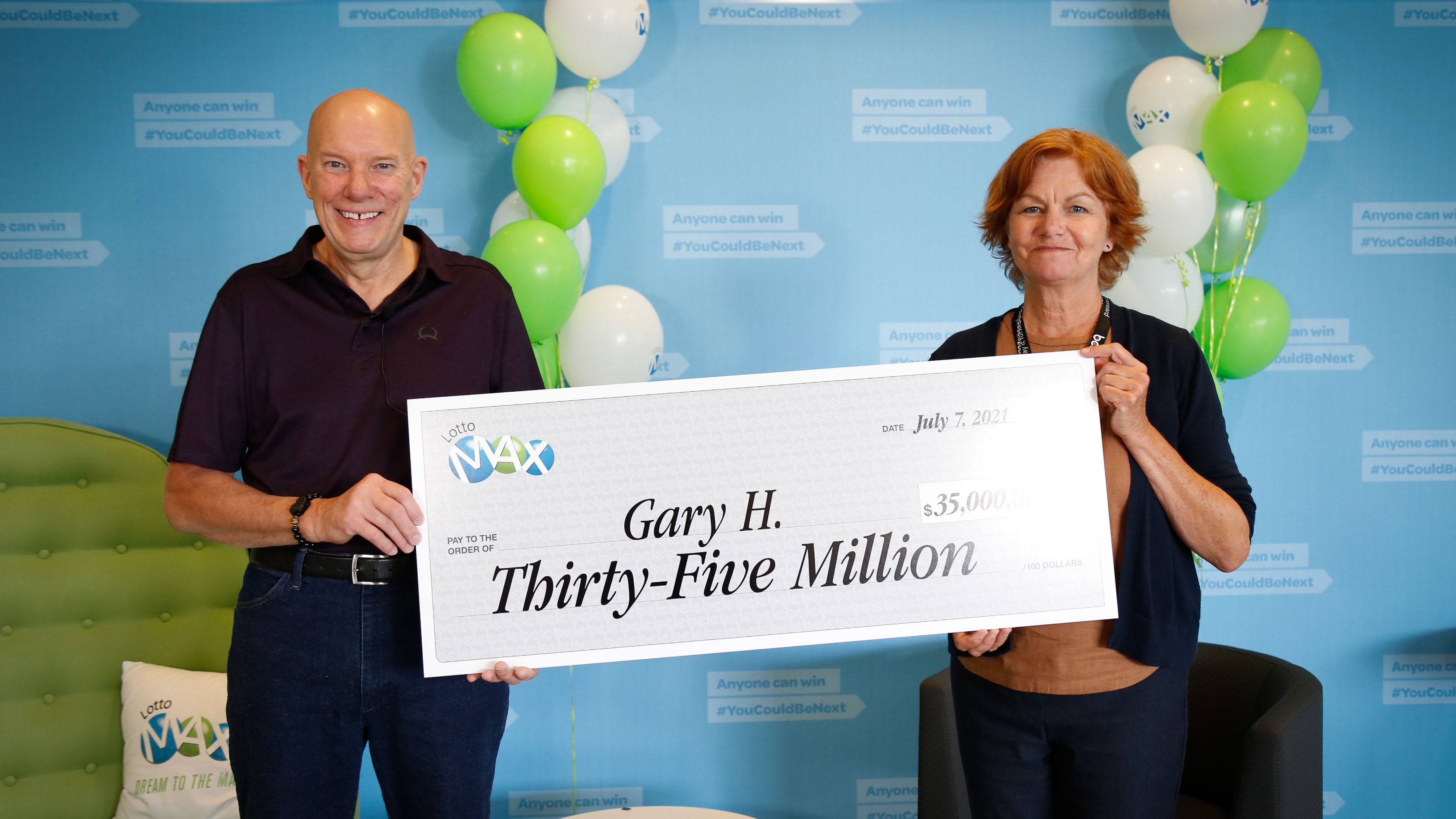 Kamloops resident Gary Hill, pictured with BCLC Interim President and CEO Lynda Cavanaugh